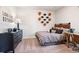 Teen bedroom with sports decor, study space and neutral color palette at 1603 Caldwell Bend Ln, Dacula, GA 30019