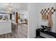 Inviting entryway with bench, coat rack, and view of the bright, open-concept living area at 1603 Caldwell Bend Ln, Dacula, GA 30019