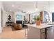 Open-concept layout seamlessly integrates the kitchen, providing a perfect space for cooking, dining, and socializing at 1603 Caldwell Bend Ln, Dacula, GA 30019