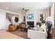 Living room with fireplace, hardwood floors, and seating at 1603 Caldwell Bend Ln, Dacula, GA 30019