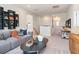 Cozy upstairs living area featuring a comfortable couch at 1603 Caldwell Bend Ln, Dacula, GA 30019