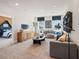 Comfortable living room featuring an L-shaped couch and TV at 1603 Caldwell Bend Ln, Dacula, GA 30019