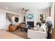 Stylish living room featuring modern furniture, a fireplace, decor, and hardwood floors, creating a welcoming space at 1603 Caldwell Bend Ln, Dacula, GA 30019