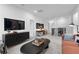 Cozy upstairs loft featuring a television, work space, and comfortable seating area at 1603 Caldwell Bend Ln, Dacula, GA 30019