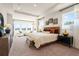 Spacious main bedroom with tray ceiling and plenty of natural light at 1603 Caldwell Bend Ln, Dacula, GA 30019