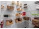 Organized pantry with wire shelving and various food and household items for optimal storage at 1603 Caldwell Bend Ln, Dacula, GA 30019
