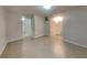 Neutral bedroom with tile flooring and access to a hallway at 1699 Redan W, Lithonia, GA 30058