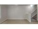 Simple dining area with neutral-colored walls and carpeting at 1699 Redan W, Lithonia, GA 30058