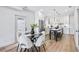 Kitchen and dining area with light hardwood floors and modern decor at 337 Pine Ne St # A, Atlanta, GA 30308