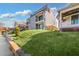 Modern home with a gray and white exterior, landscaping and stone retaining wall at 337 Pine Ne St # A, Atlanta, GA 30308