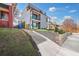 Modern home with a gray and white exterior, landscaping, and a concrete driveway at 337 Pine Ne St # A, Atlanta, GA 30308