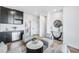 Cozy seating area with modern bar, marble topped accent table and mini fridge at 337 Pine Ne St # A, Atlanta, GA 30308