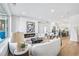 Living room features a white couch, fireplace, and hardwood floors at 337 Pine Ne St # A, Atlanta, GA 30308