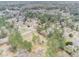 Aerial view showing home's location in a wooded suburban neighborhood at 3496 Wesley Chapel Rd, Decatur, GA 30034