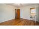 Bedroom with hardwood floors and ensuite bathroom at 3496 Wesley Chapel Rd, Decatur, GA 30034