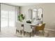 Elegant dining room with a gray table and white chairs at 512 Altamaha Ct, Locust Grove, GA 30248