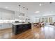 Modern kitchen with island, stainless steel appliances, and hardwood floors at 230 Crescent Sw Cir, Marietta, GA 30064