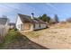 House with backyard, patio, and fire pit at 1708 Queen Victoria Ct, Locust Grove, GA 30248