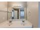 Bathroom with double vanity and separate tub and shower at 1708 Queen Victoria Ct, Locust Grove, GA 30248