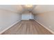 Spacious bedroom with vaulted ceiling and door to hallway at 1708 Queen Victoria Ct, Locust Grove, GA 30248