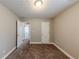 Well-lit bedroom with doors to other rooms and neutral decor at 1708 Queen Victoria Ct, Locust Grove, GA 30248