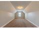 Large bedroom with vaulted ceiling and window at 1708 Queen Victoria Ct, Locust Grove, GA 30248