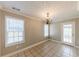 Dining room with tile floor and chandelier at 1708 Queen Victoria Ct, Locust Grove, GA 30248