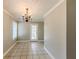 Bright dining area with tile floors and patio access at 1708 Queen Victoria Ct, Locust Grove, GA 30248