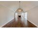 Spacious living room with hardwood floors and fireplace at 1708 Queen Victoria Ct, Locust Grove, GA 30248