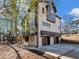 Modern farmhouse with two-car garage and deck at 3491 Sexton Woods Dr, Atlanta, GA 30341