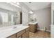 Double vanity bathroom with a garden tub and shower at 2128 Mill Garden Run, Buford, GA 30519