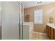 Bathroom with shower and garden tub at 2128 Mill Garden Run, Buford, GA 30519