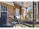 Brick patio with rocking chairs at 2128 Mill Garden Run, Buford, GA 30519