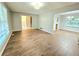 Spacious living room featuring hardwood floors and lots of natural light at 4550 Cypress Ridge Ct, Stone Mountain, GA 30083