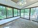 Bright sunroom with sliding glass doors and view of backyard at 4550 Cypress Ridge Ct, Stone Mountain, GA 30083