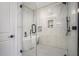 Spa-like bathroom with a freestanding tub, walk-in shower, and marble tile at 862 Hobson Sw St, Atlanta, GA 30310