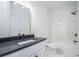 Modern bathroom with white vanity and bathtub at 862 Hobson Sw St, Atlanta, GA 30310