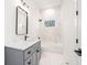 Clean bathroom with gray vanity and marble-look shower at 862 Hobson Sw St, Atlanta, GA 30310