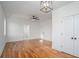 Spacious bedroom with hardwood floors and ceiling fan at 862 Hobson Sw St, Atlanta, GA 30310