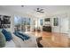 Bright bedroom featuring hardwood floors and sliding glass doors at 862 Hobson Sw St, Atlanta, GA 30310