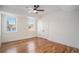 Bright bedroom with hardwood floors and two windows at 862 Hobson Sw St, Atlanta, GA 30310