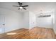 Bright bedroom with hardwood floors and ceiling fan at 862 Hobson Sw St, Atlanta, GA 30310