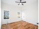 Well-lit bedroom featuring hardwood floors and ceiling fan at 862 Hobson Sw St, Atlanta, GA 30310