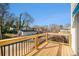 Deck with wooden railings and view of residential neighborhood at 862 Hobson Sw St, Atlanta, GA 30310