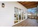 Wooden deck with glass doors and view of neighborhood at 862 Hobson Sw St, Atlanta, GA 30310