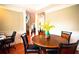 Dining area showcasing a round wooden table with four chairs and access to living areas at 643 Robinson Se Ave, Atlanta, GA 30312