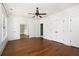 Large bedroom with hardwood floors and double doors at 1648 Beacon Hill Ne Blvd, Atlanta, GA 30329