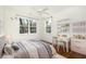 bedroom with built in shelving, desk and comfortable bed at 1648 Beacon Hill Ne Blvd, Atlanta, GA 30329