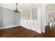 Bright dining room with hardwood floors and built-in shelving at 1648 Beacon Hill Ne Blvd, Atlanta, GA 30329