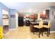 Modern kitchen with dark wood cabinets, black appliances, and tile backsplash at 2513 Sonoma Vly, Villa Rica, GA 30180